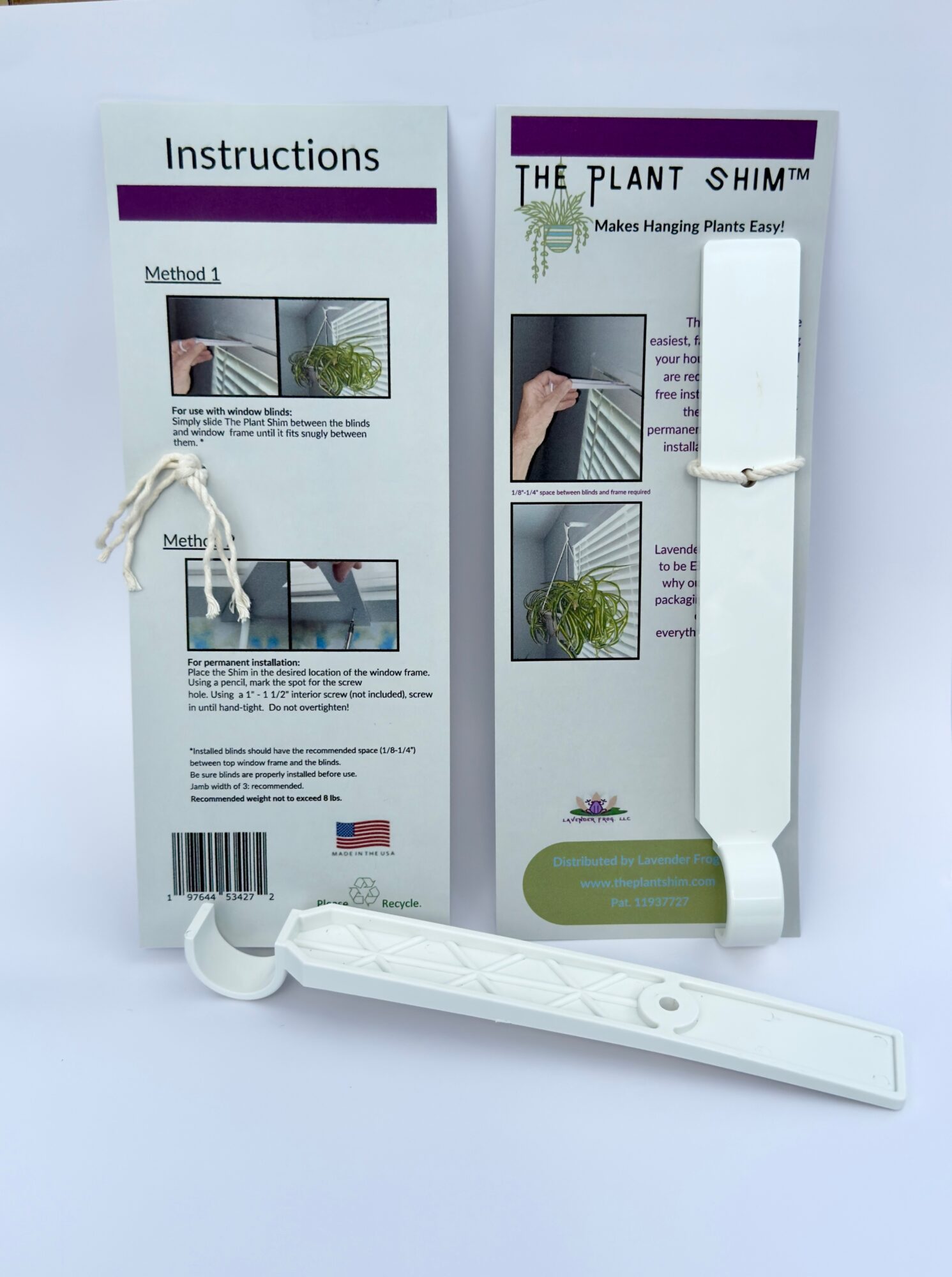 Instruction sheet with plant hanger product, showing methods for hanging plants, and a white plastic plant hanger with a strap.