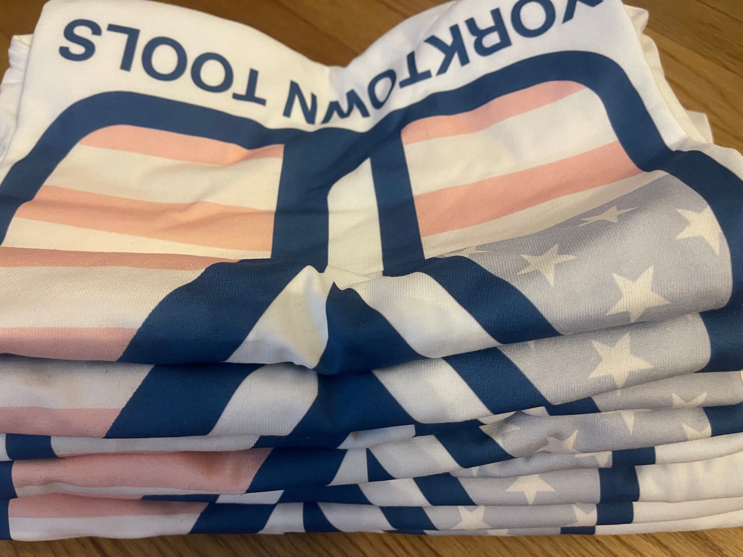 Folded fabric with a design featuring stars and stripes, and text reading 'NORTHOWN TOOLS'.