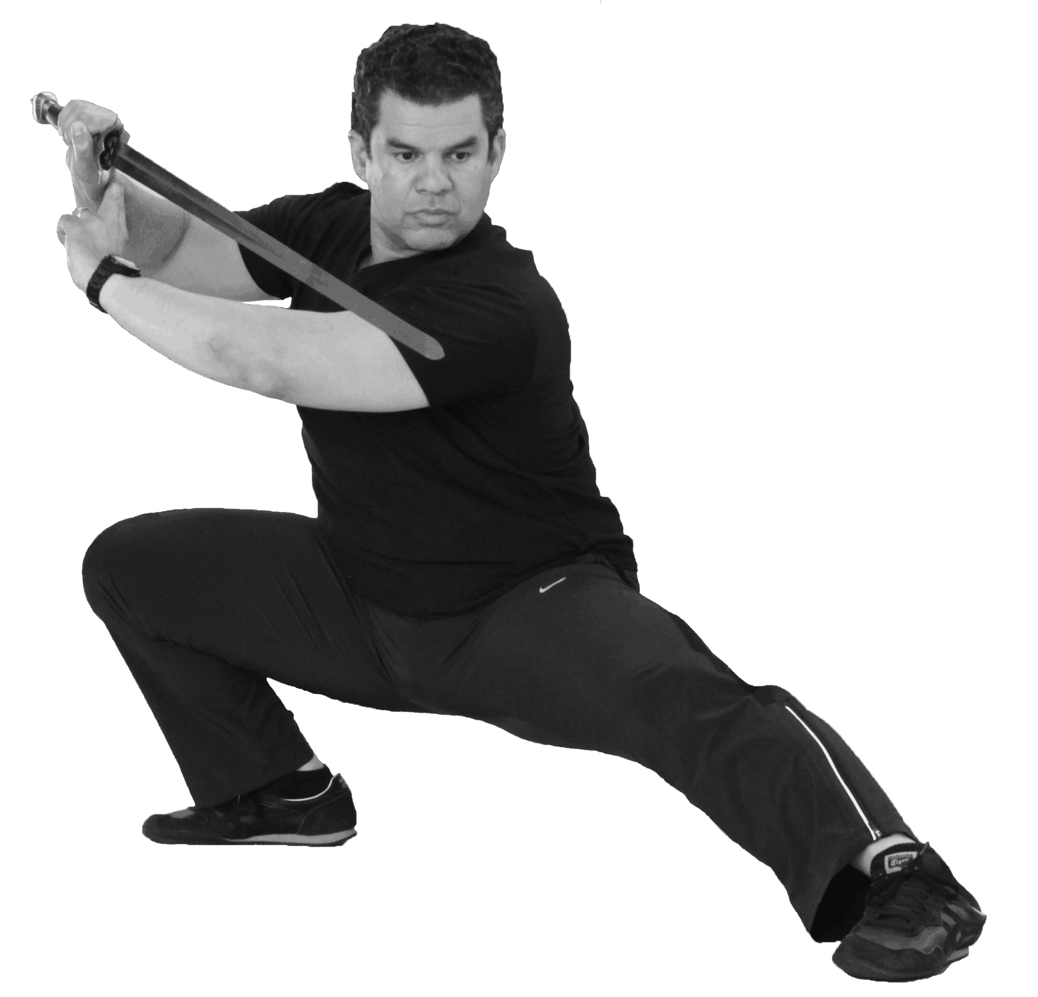Person in a wide stance holding a sword with both hands, ready for action, against a black background.
